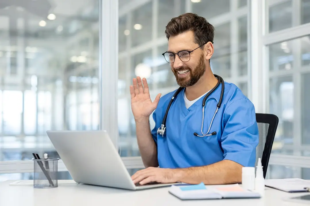 Male nurse chatting with a patient